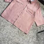 Shimmery rose-gold button up shirt