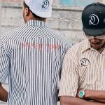 White and black pinstriped button up shirt